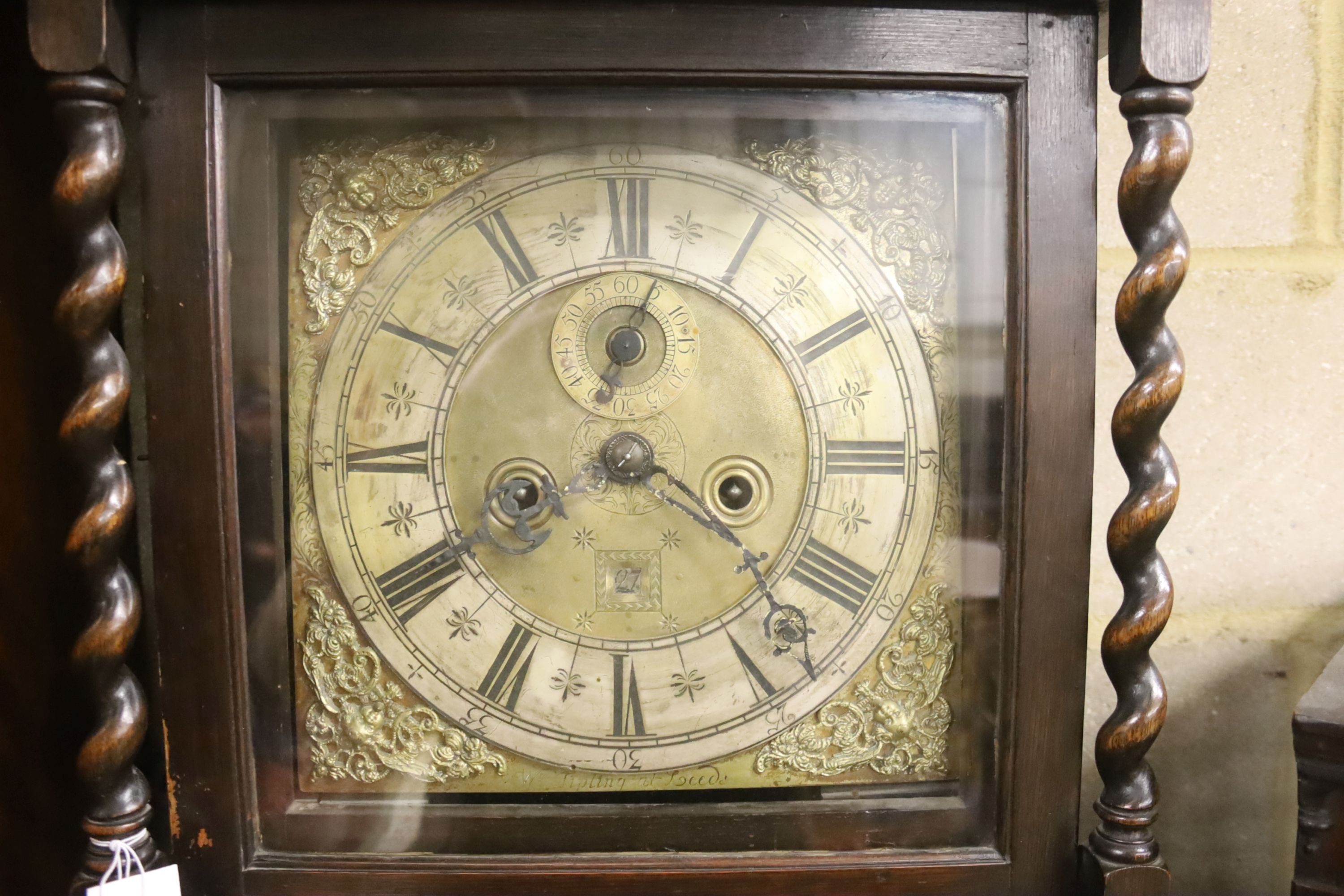 An 18th century oak 8 day longcase clock, marked Wm. Tipling at Leeds, later cased, height 208cm